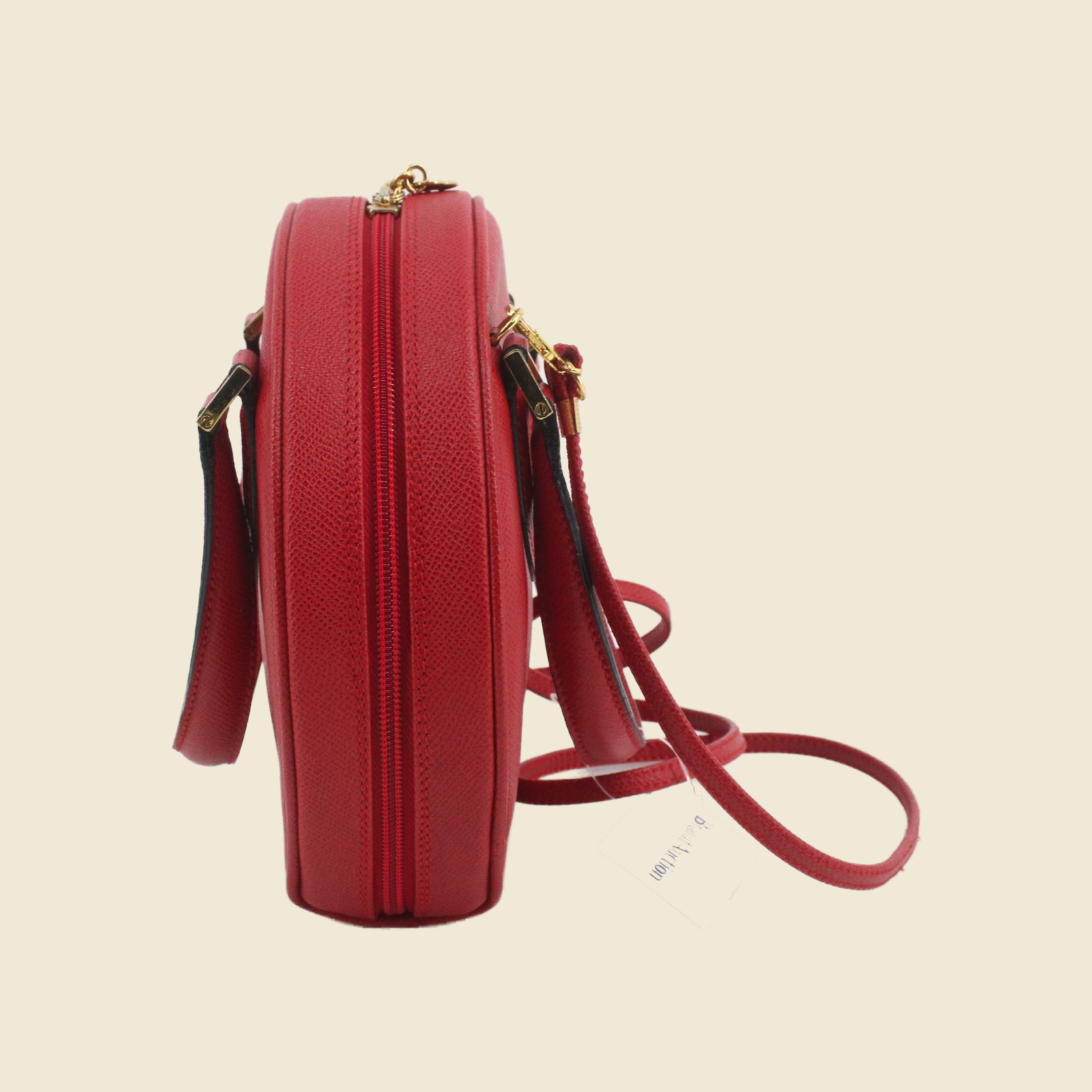 Borsa a mano Bally tonda in pelle granulata rossa con ferramenta dorata, doppio manico e tracolla, vista frontale — vista 4