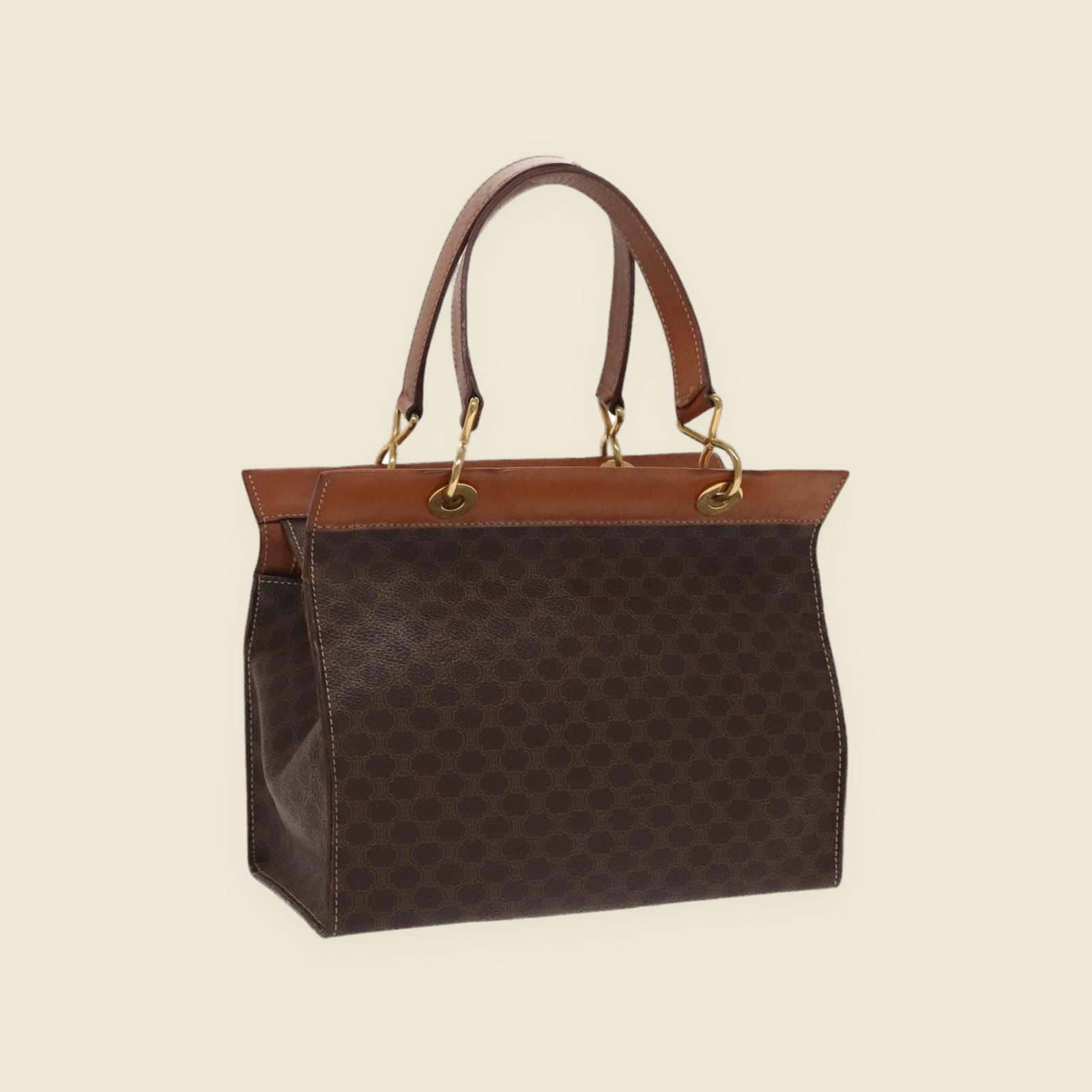 Borsa a mano Celine in tela monogramma marrone, profili e doppi manici in cuoio, ferramenta dorata, vista di tre quarti