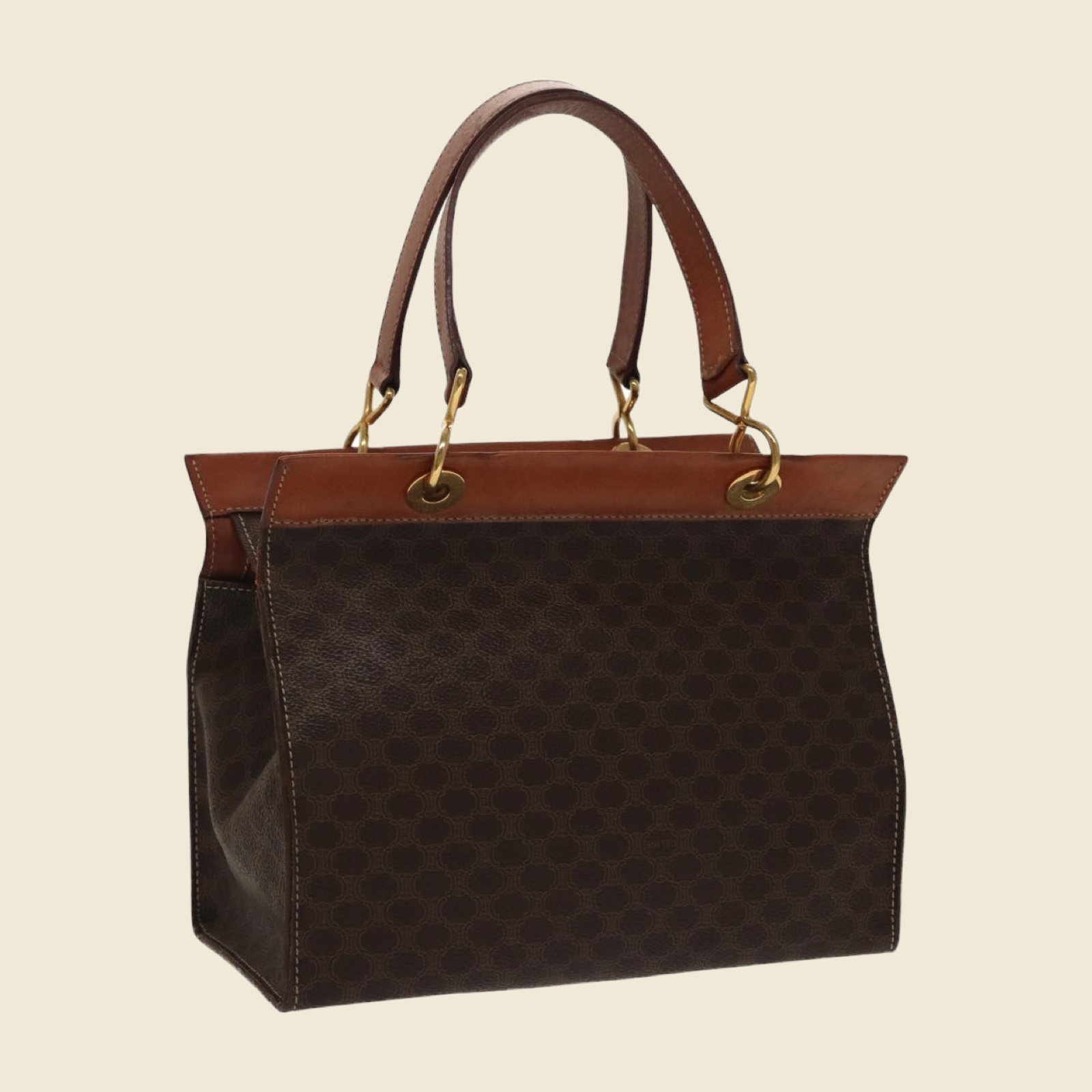 Borsa a mano Celine in tela monogramma marrone, profili e doppi manici in cuoio, ferramenta dorata, vista di tre quarti