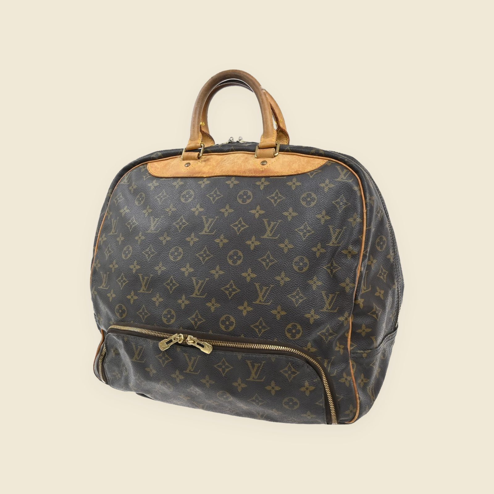 Borsone da viaggio Louis Vuitton in tela monogram e pelle con doppio manico e tasca frontale con zip, vista di tre quarti
