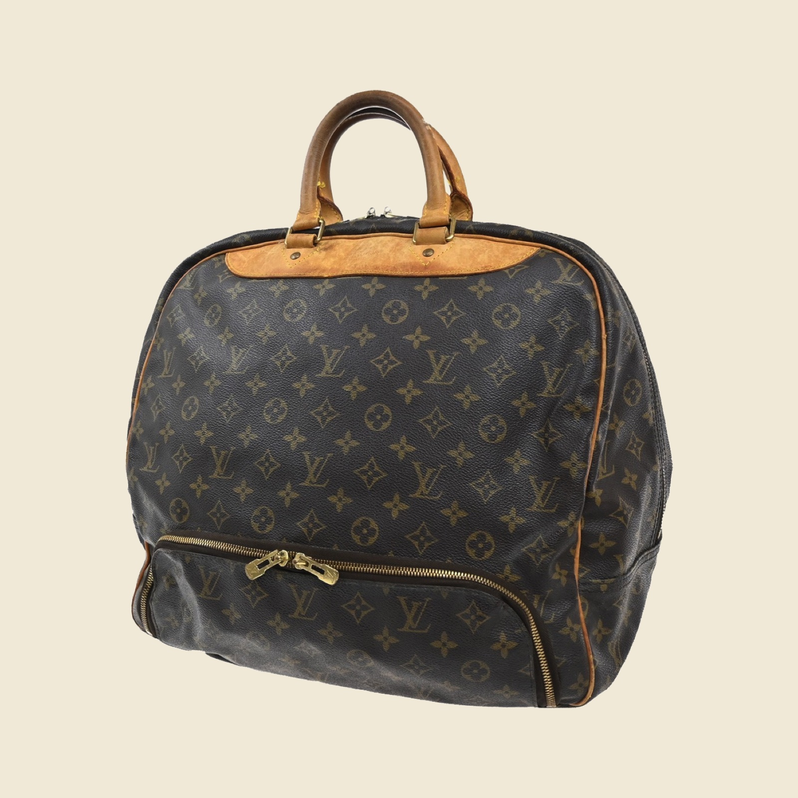 Borsone da viaggio Louis Vuitton in tela monogramma e pelle con doppio manico e tasca frontale con zip, vista di tre quarti
