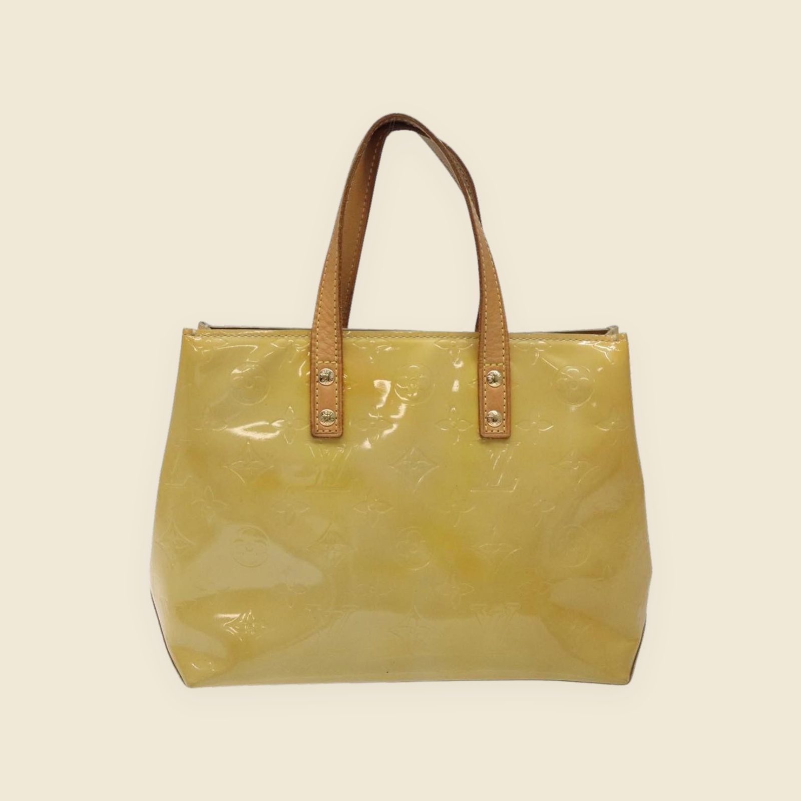Borsa a mano Louis Vuitton in pelle verniciata gialla con Monogram impresso e doppio manico, vista frontale — vista 2