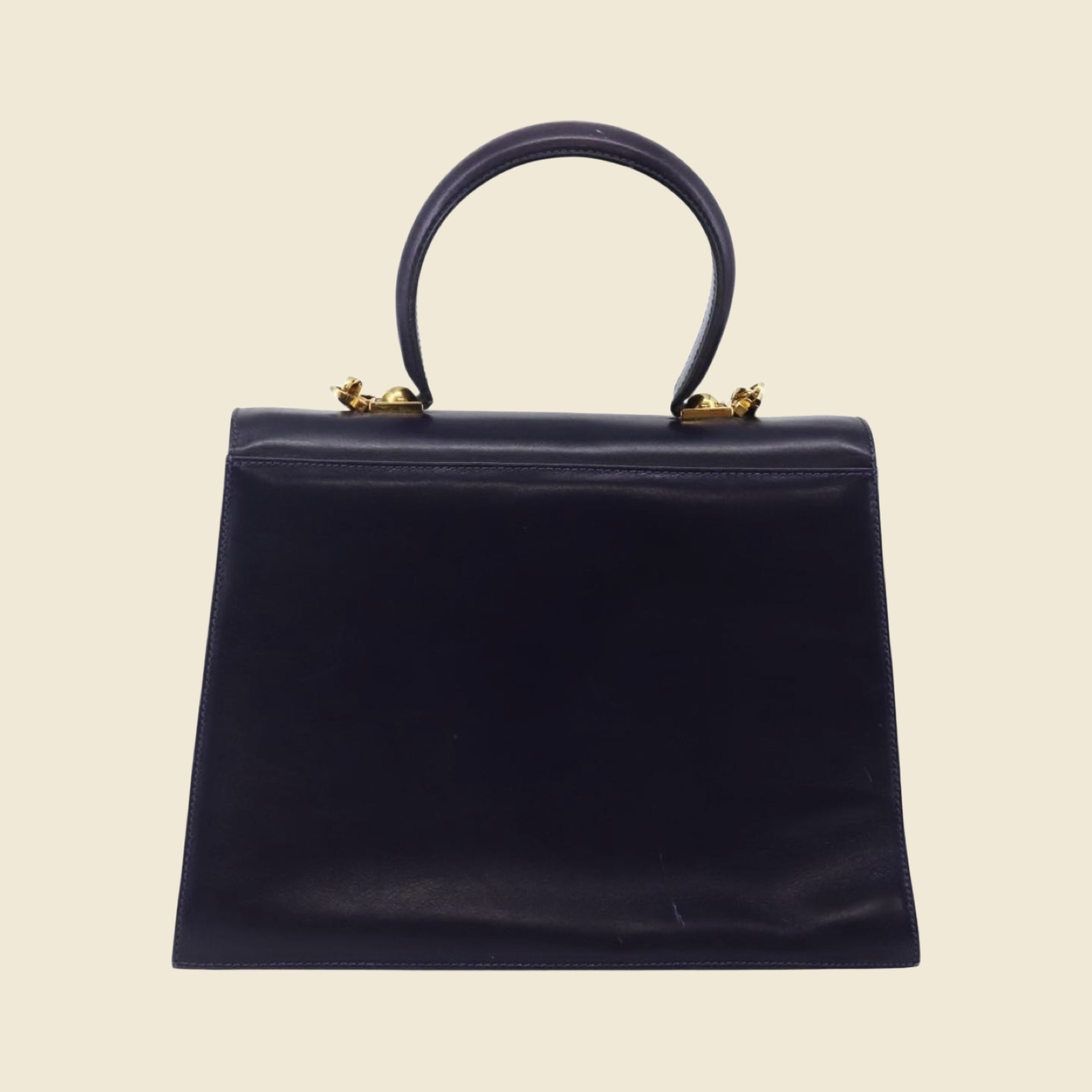 Borsa a mano Salvatore Ferragamo in pelle blu scuro, chiusura ad anello dorata, manico superiore, vista frontale — vista 2