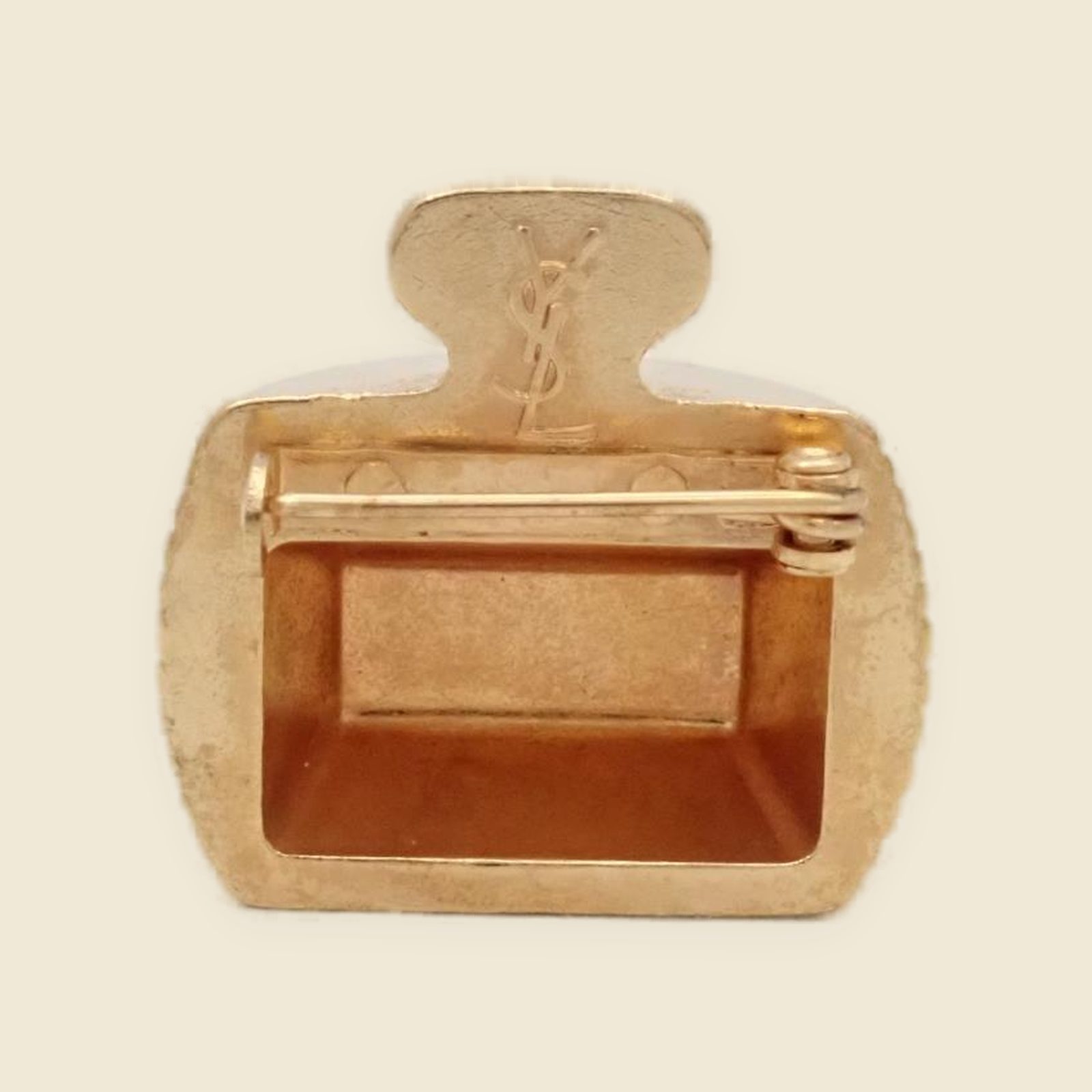 Spilla vintage Yves Saint Laurent, vista frontale su fondo neutro — vista 2